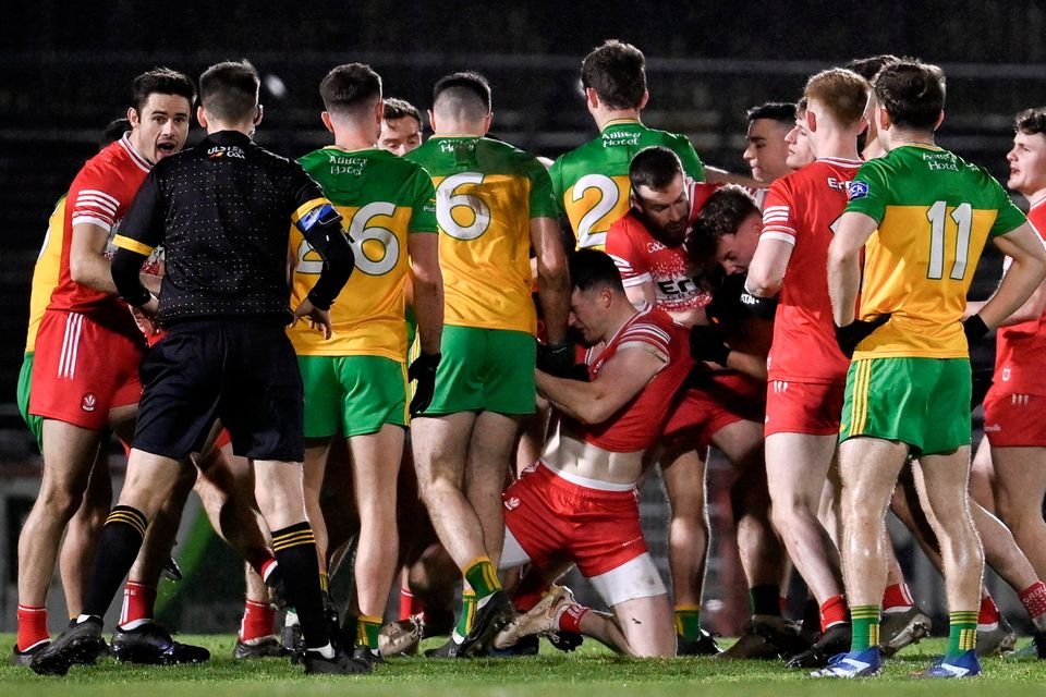 Players from both teams tussle during the Dr McKenna Cup final match between Derry and Donegal at O'Neills Healy Park in Omagh. Photo by Ramsey Cardy/Sportsfile
