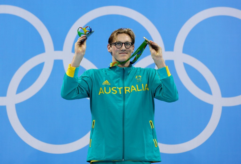 Australia's gold medal winner Mack Horton celebrates on the podium during the ceremony for the men's 400-meter freestyle final during the swimming competitions at the 2016 Summer Olympics.