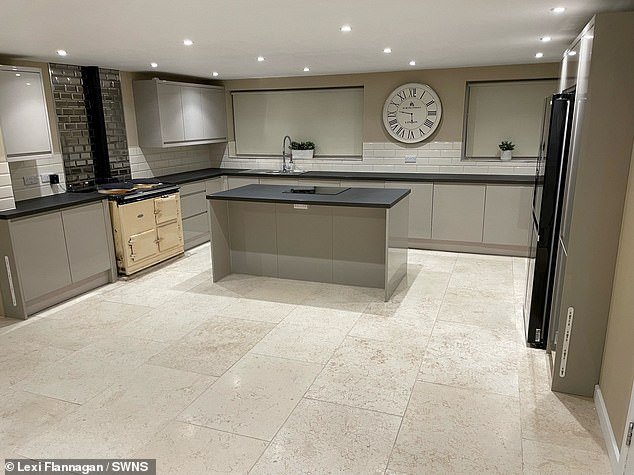 The open-plan kitchen that features a brand new worktop unit and appliances