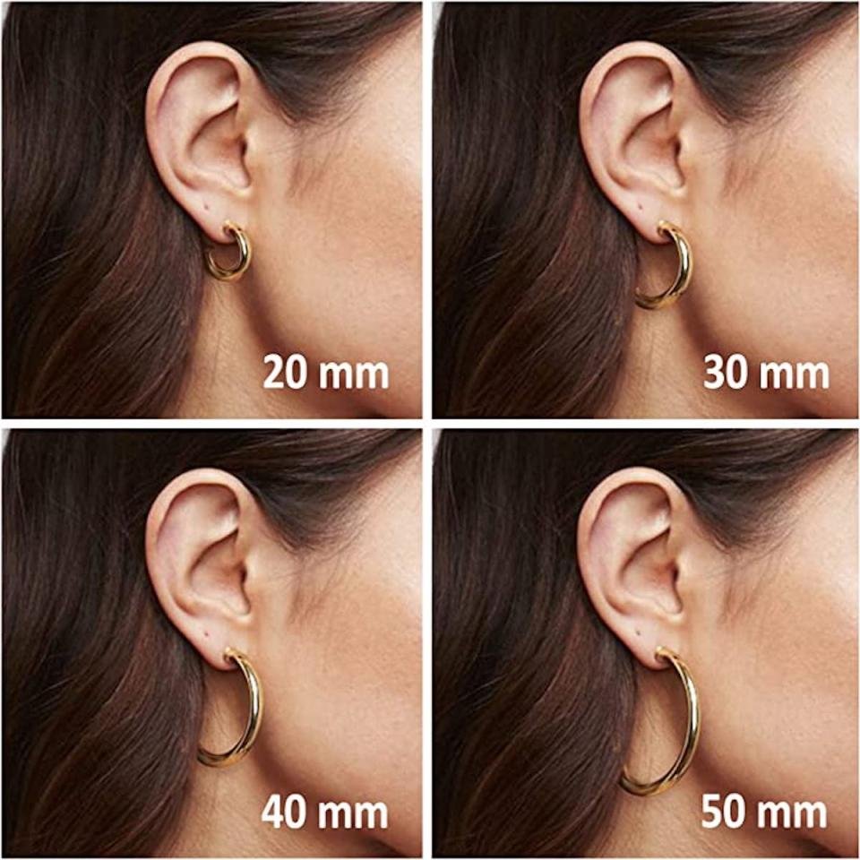 woman wearing gold hoop earings in 4 sizes from 20mm to 50mm