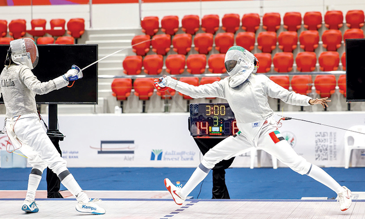 Emiratis Mahra Abdullah and Asila Darwish in action during their fencing match at AWST.