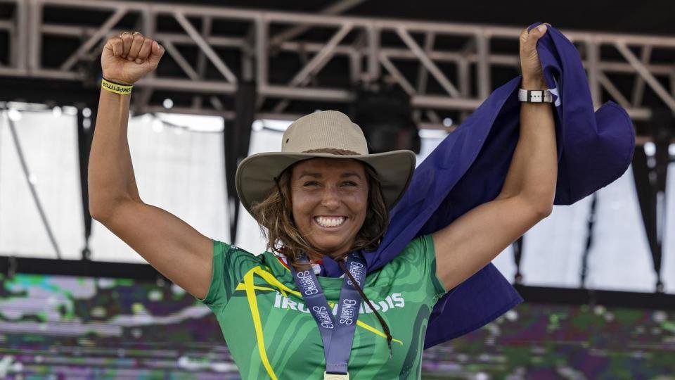 Sally Fitzgibbons celebrates her ISA world title.