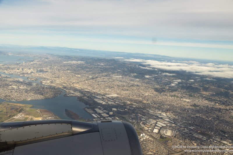 an aerial view of a city and water