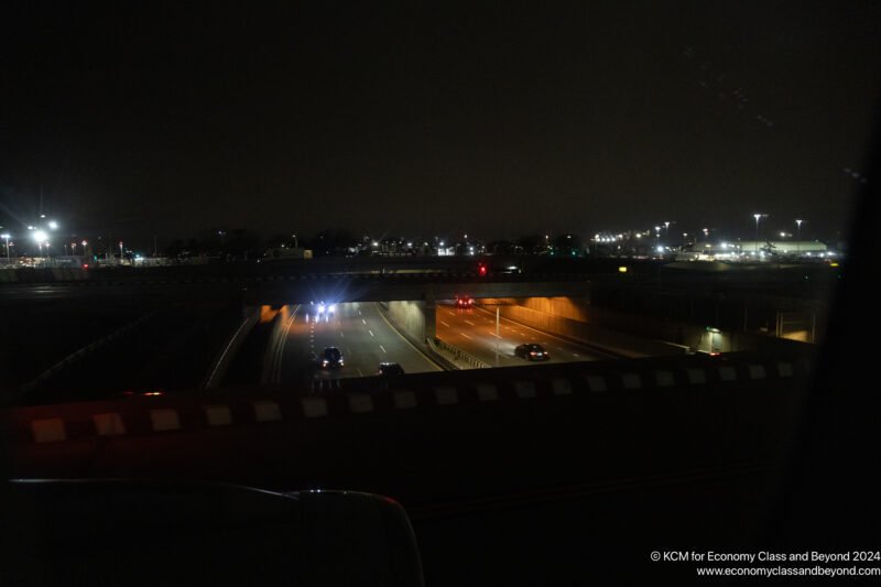 a highway at night with lights on