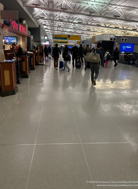 people walking in a terminal