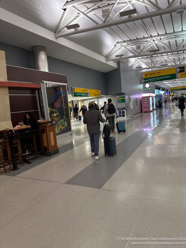 people walking in a terminal