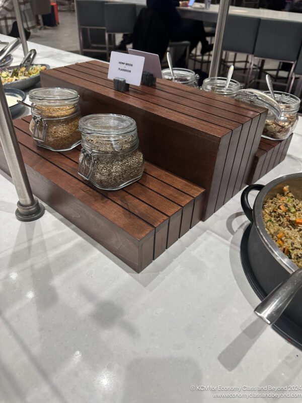 a wooden shelf with food on it