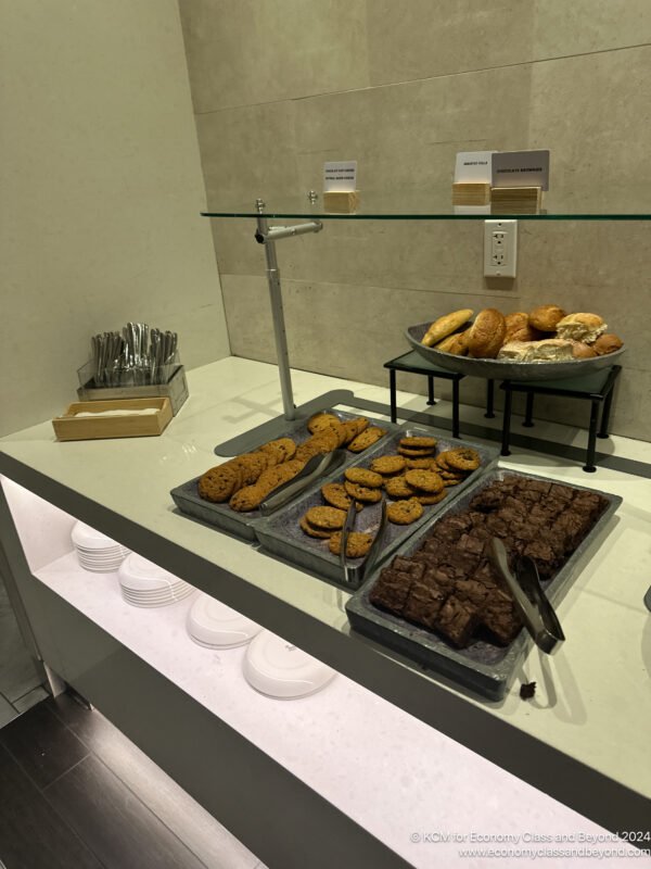 a trays of cookies and pastries on a counter