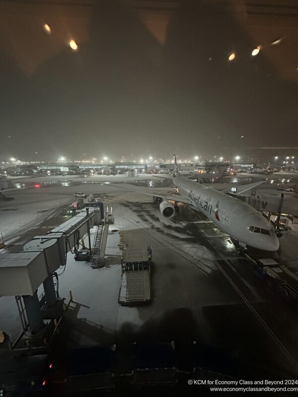 an airport with airplanes on the ground