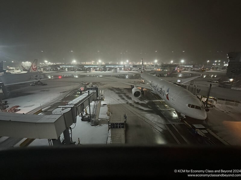 an airport with airplanes on the ground