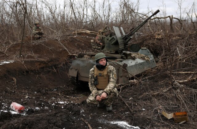 TOPSHOT - Ukrainian anti-aircraft gunners of the 93rd Separate Mechanized Brigade Kholodny Yar monitor the sky from their positions in the direction of Bakhmut in the Donetsk region, amid the Russian invasion of Ukraine, on February 20, 2024. (Photo by Anatolii STEPANOV / AFP) (Photo by ANATOLII STEPANOV/AFP via Getty Images)