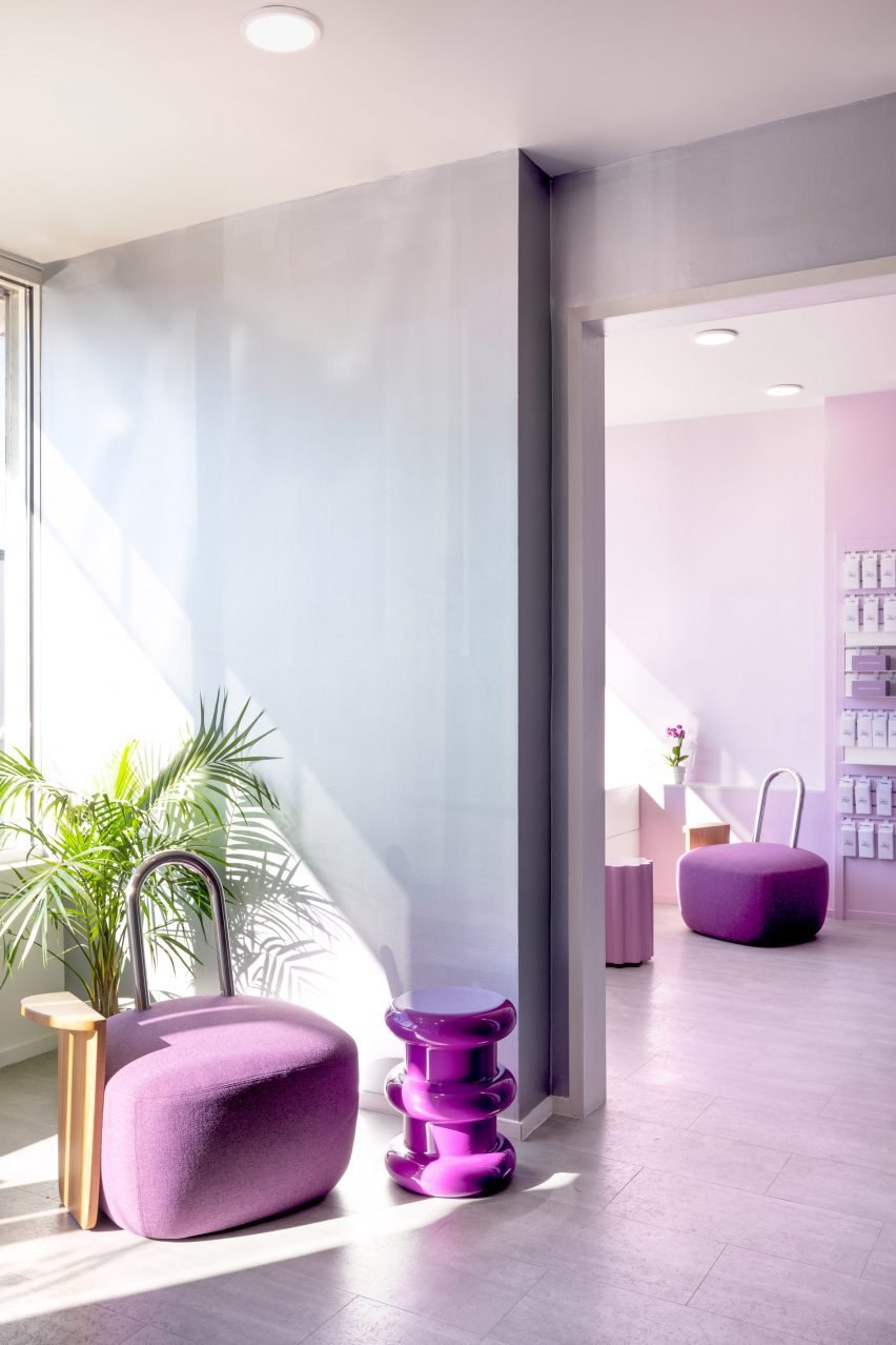 Pharmacy waiting room with purple furniture