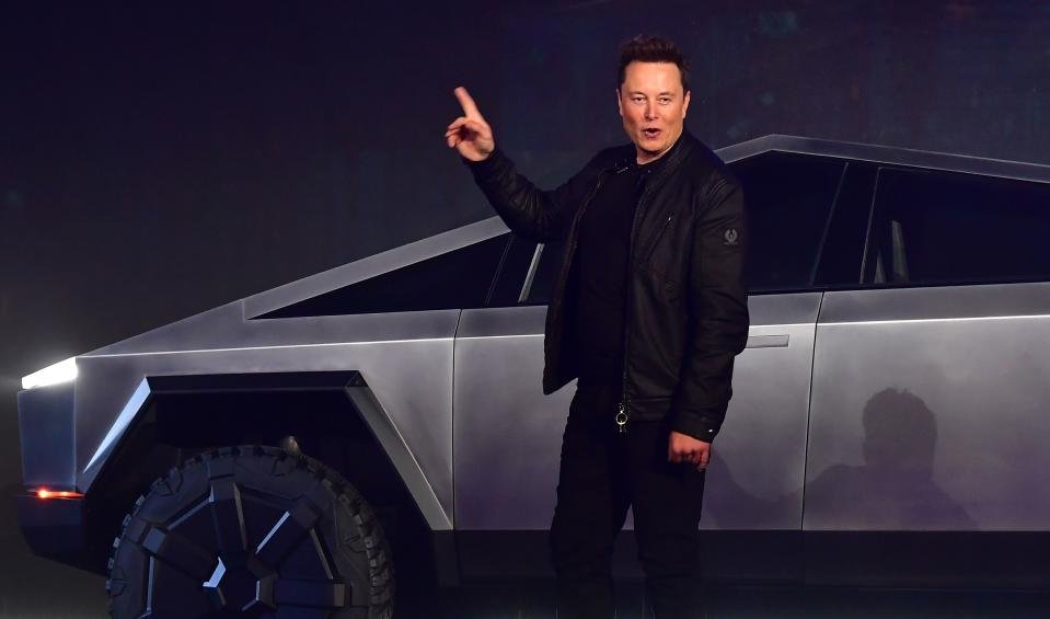 Tesla co-founder and CEO Elon Musk gestures while introducing the newly unveiled all-electric battery-powered Tesla Cybertruck at Tesla Design Center in Hawthorne, California on November 21, 2019. (Photo by Frederic J. BROWN / AFP) (Photo by FREDERIC J. BROWN/AFP via Getty Images)