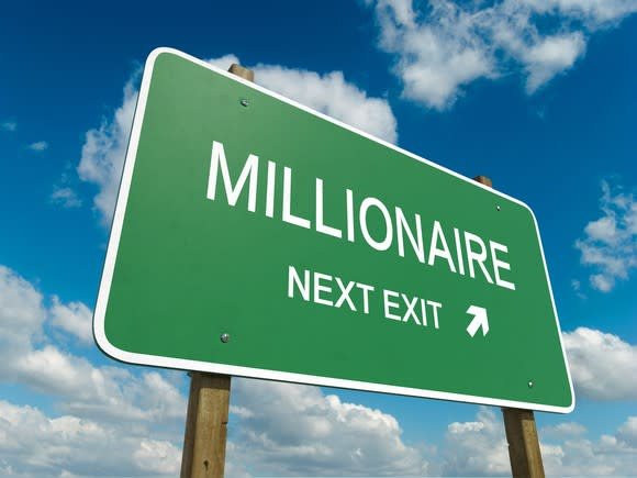 A road sign pointing to millionaire with the words "millionaire next exit."