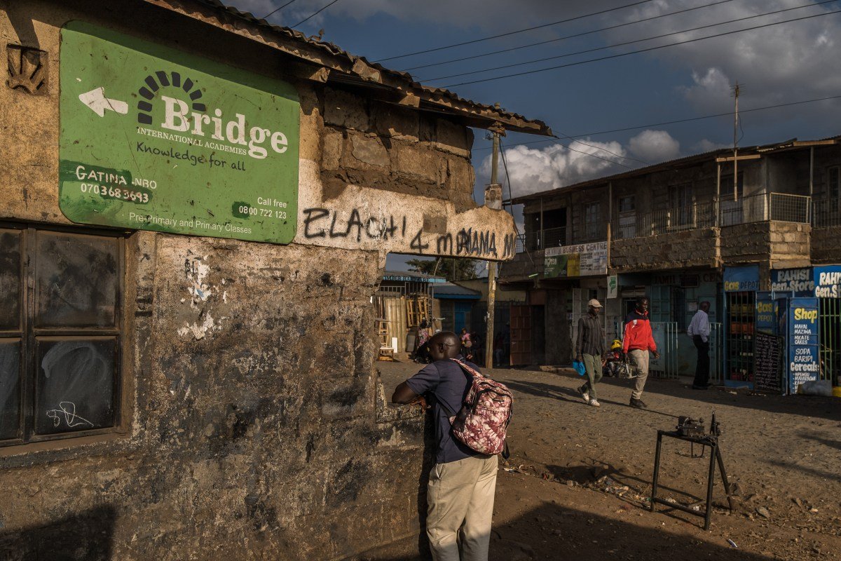 NAIROBI, KENYA - MARCH 11, 2023:  A signpost promoting Bridge Academies stands on a street corner in Nairobi, Kenya. PHOTO BY BRIAN OTIENO for The Intercept