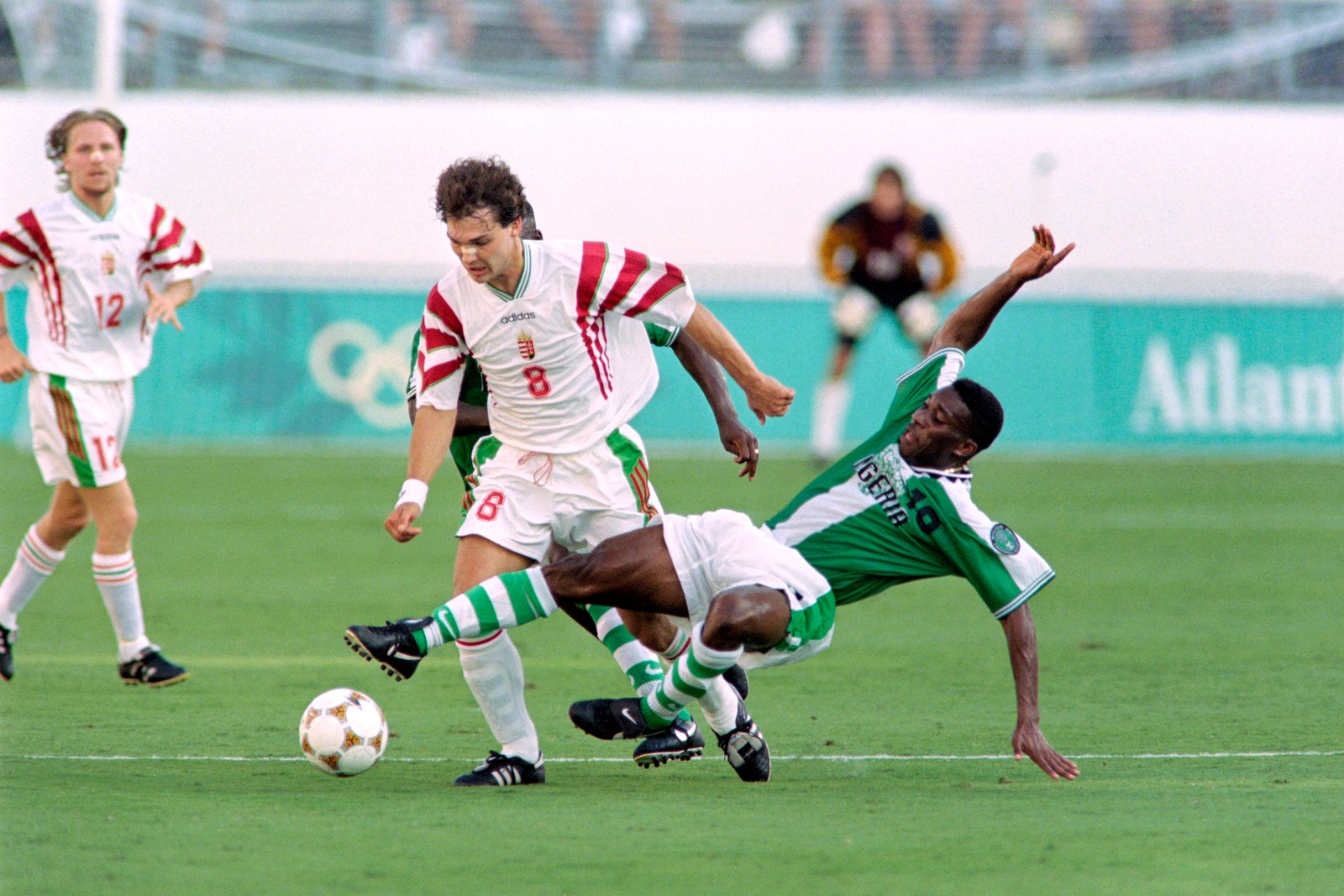 Nigeria's Jay-Jay Okocha (right) fights for the ball with Hungary's Tamas Sandor at the 1996 Olympics in Atlanta.