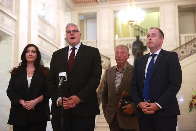 Ms Little-Pengelly, left to right, DUP party leader Gavin Robinson MP, Sammy Wilson MP, and Paul Girvan