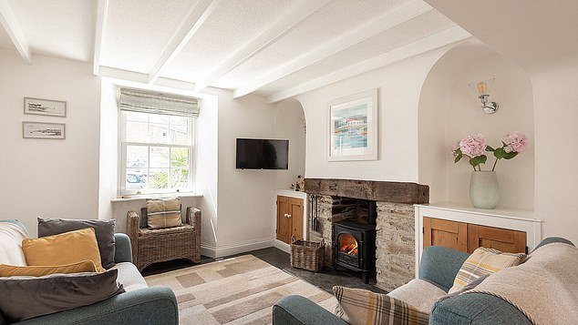 It has been stylishly refurbished and includes a cosy wood burner