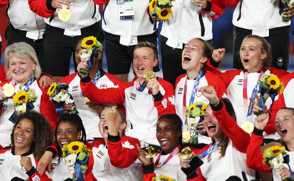 Bev Priestman, pictured here with her team after their gold medal triumph at the 2021 Olympics.