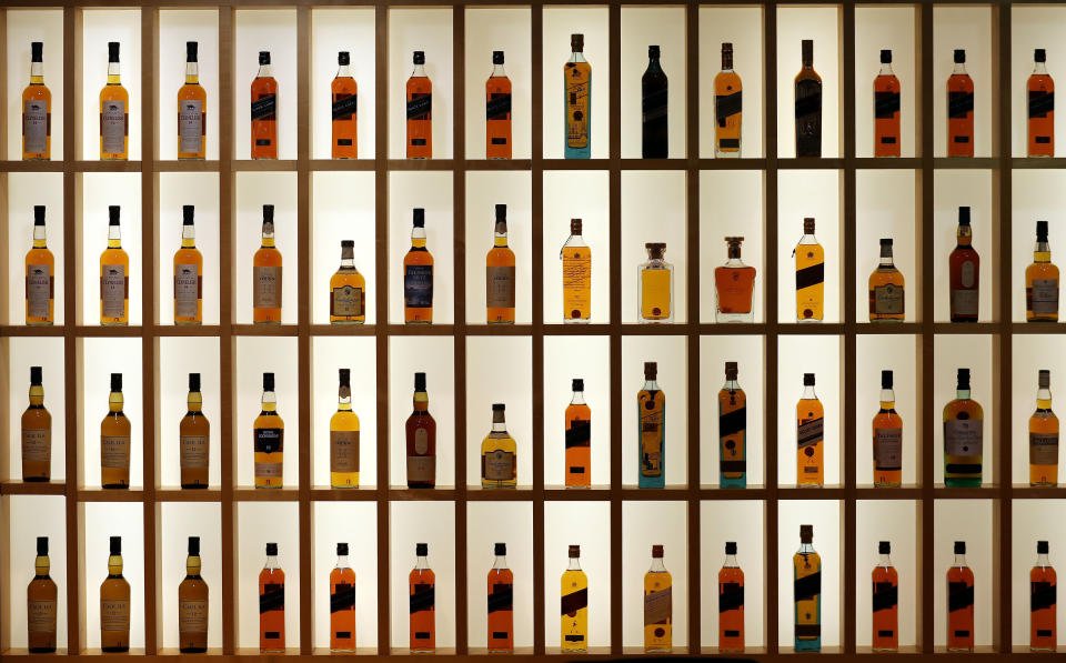 Diageo owned whiskies on the whisky wall at their headquarters in Edinburgh where the company announced a £150 million investment over three years to 