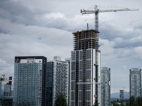 Buildings under construction are pictured in Surrey, B.C. on June 26, 2024.