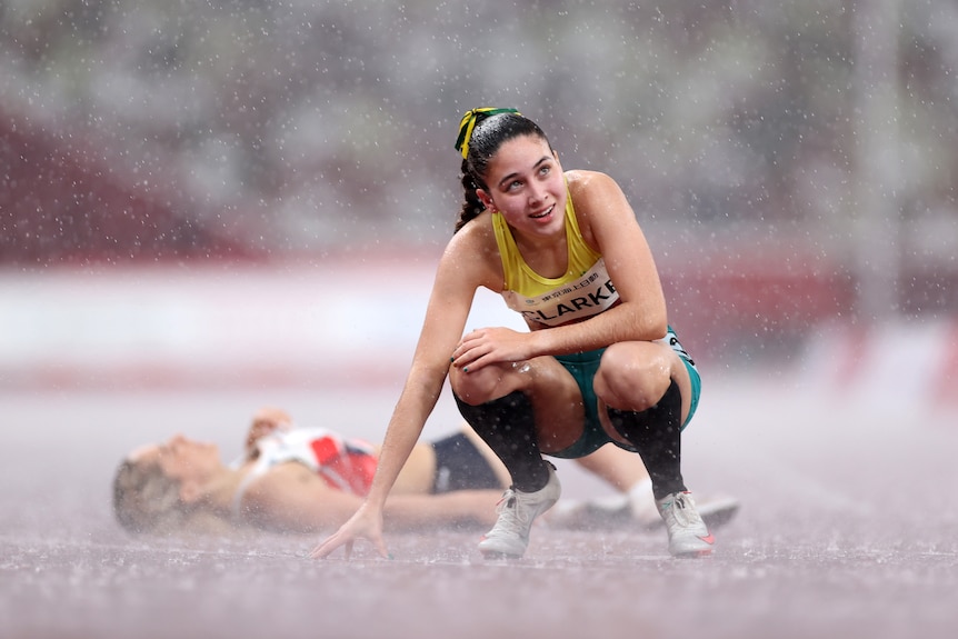 Rhiannon Clarke looks at the sky after finishing fifth in the T38 100m sprint at the Tokyo Paralympics