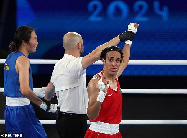 Imane Khelif of Algeria celebrates winning against Liu Yang of China