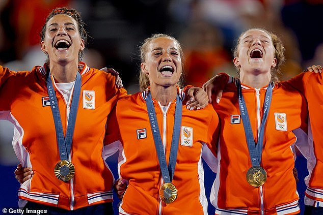 Burg (centre) was not involved in the final win  but later appeared alongside team-mates