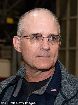 Former prisoner released by Russia, former US marine Paul Whelan looks on after landing at Joint Base San Antonio-Kelly Field, Texas, on August 2