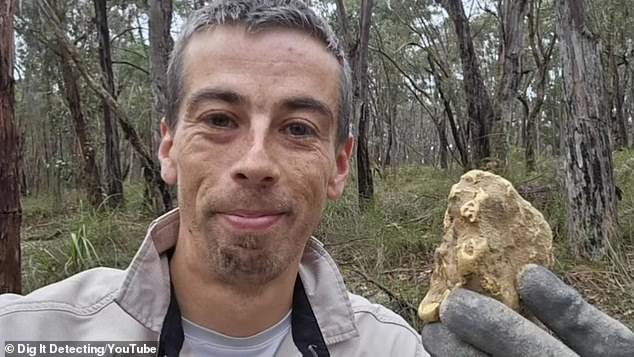 Luke Phillips (pictured) from Victoria dug for over an hour after his metal detector picked up a faint sound under a log