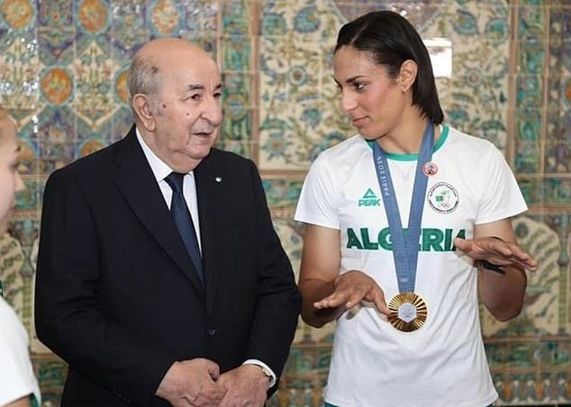 Khelif can be seen laughing and chatting with the president of her country in the post