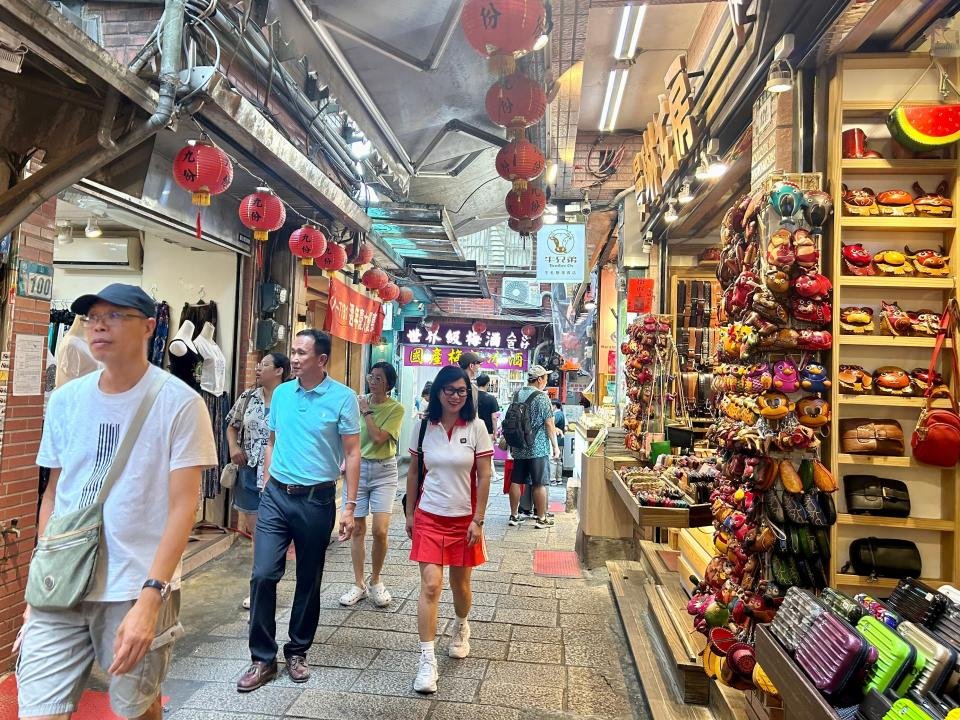 Tourists shopping in Jiufen Old Street.