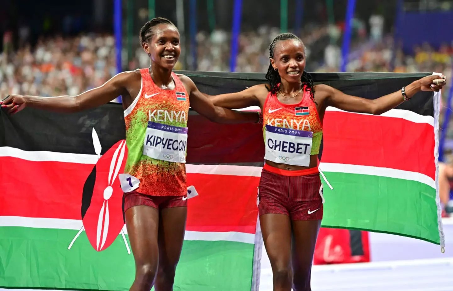 Faith Kipyegon celebrates with compatriot Beatrice Chebet after winning the silver medal in the women's 5000m final -