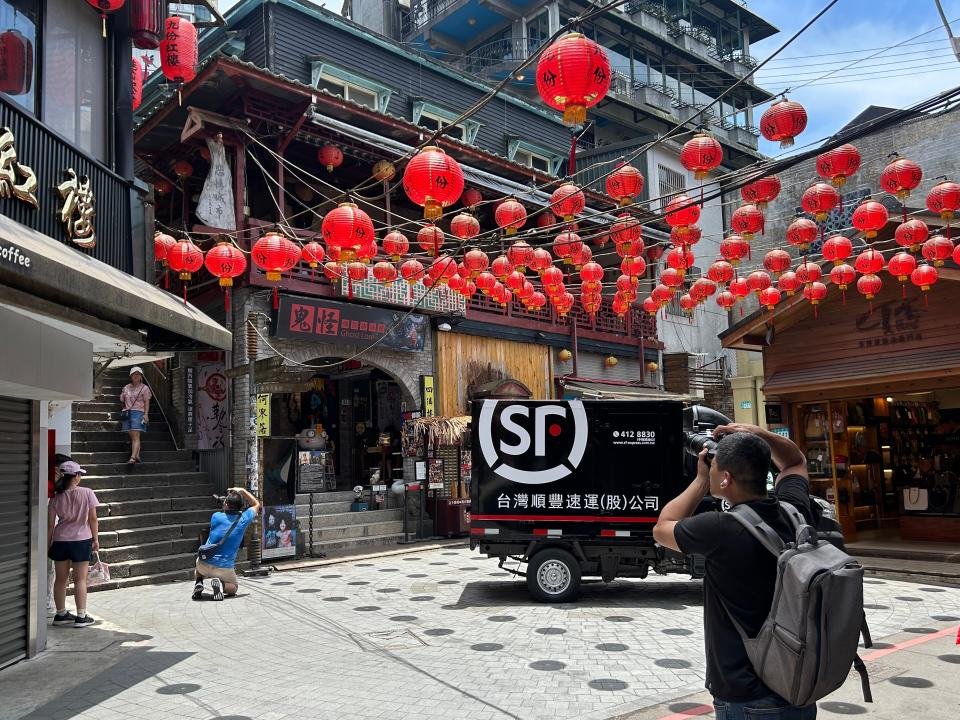 Tourists taking photos at Jiufen, Taiwan.