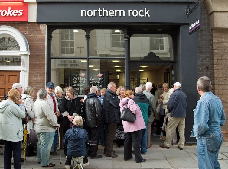 Customers queuing outside Northern Rock in September 2007