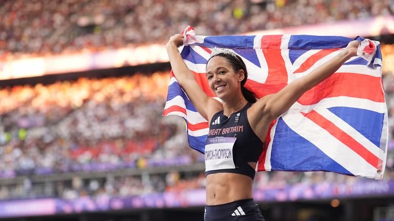 Great Britain's Katarina Johnson-Thompson celebrates after winning silver in the Women's Heptathlon at the Stade de France on the fourteenth day of the 2024 Paris Olympic Games in France. Picture date: Friday August 9, 2024.