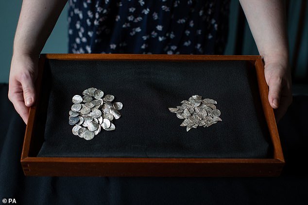 Coins from the Chew Valley Hoard found near Somerset are unveiled to the press at The British Museum