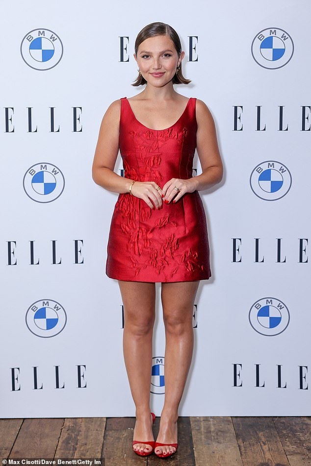 Mia McKenna-Bruce attends the ELLE Style Awards in a leggy red dress