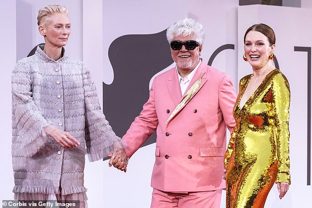 Tilda Swinton, Pedro Almodovar and Julianne Moore attend the "The Room Next Door" red carpet during the 81st Venice International Film Festival