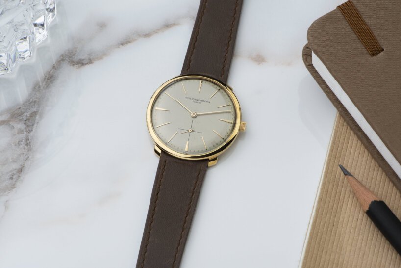 the 1957 Patrimony model that inspired the recent timepiece in yellow gold